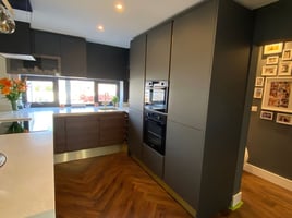Contemporary style kitchen & dining space with two tone cabinets | Raison Home - 2
