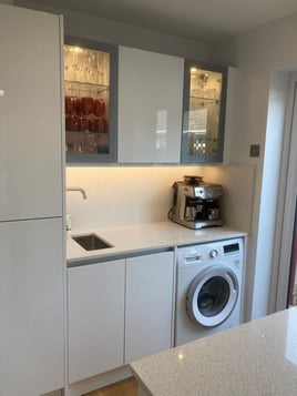 Modern utility with matching design to the kitchen | Raison Home - 1