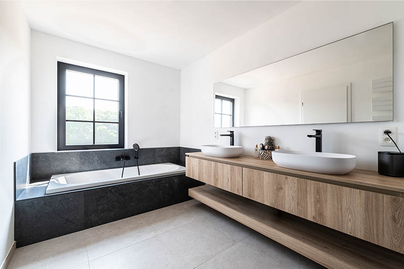 Salle de bain chaleureuse à Lasne | Raison Home - 1