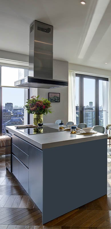 Open kitchen in modern mid blue style in London  1