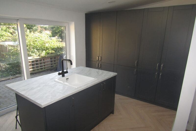 Black kitchen with shaker cabinets in Solihull 2