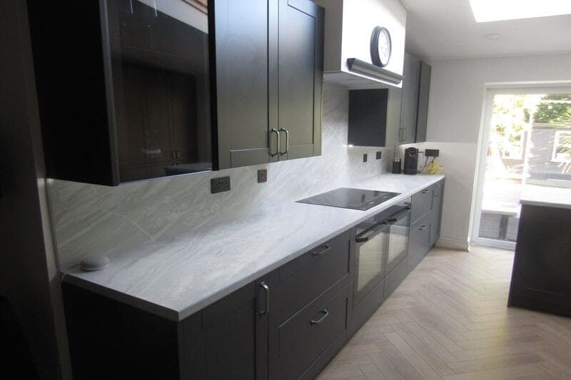 Black kitchen with shaker cabinets in Solihull 1