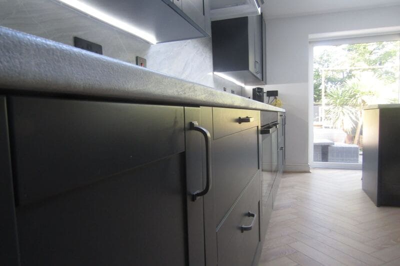 Black kitchen with shaker cabinets in Solihull 7