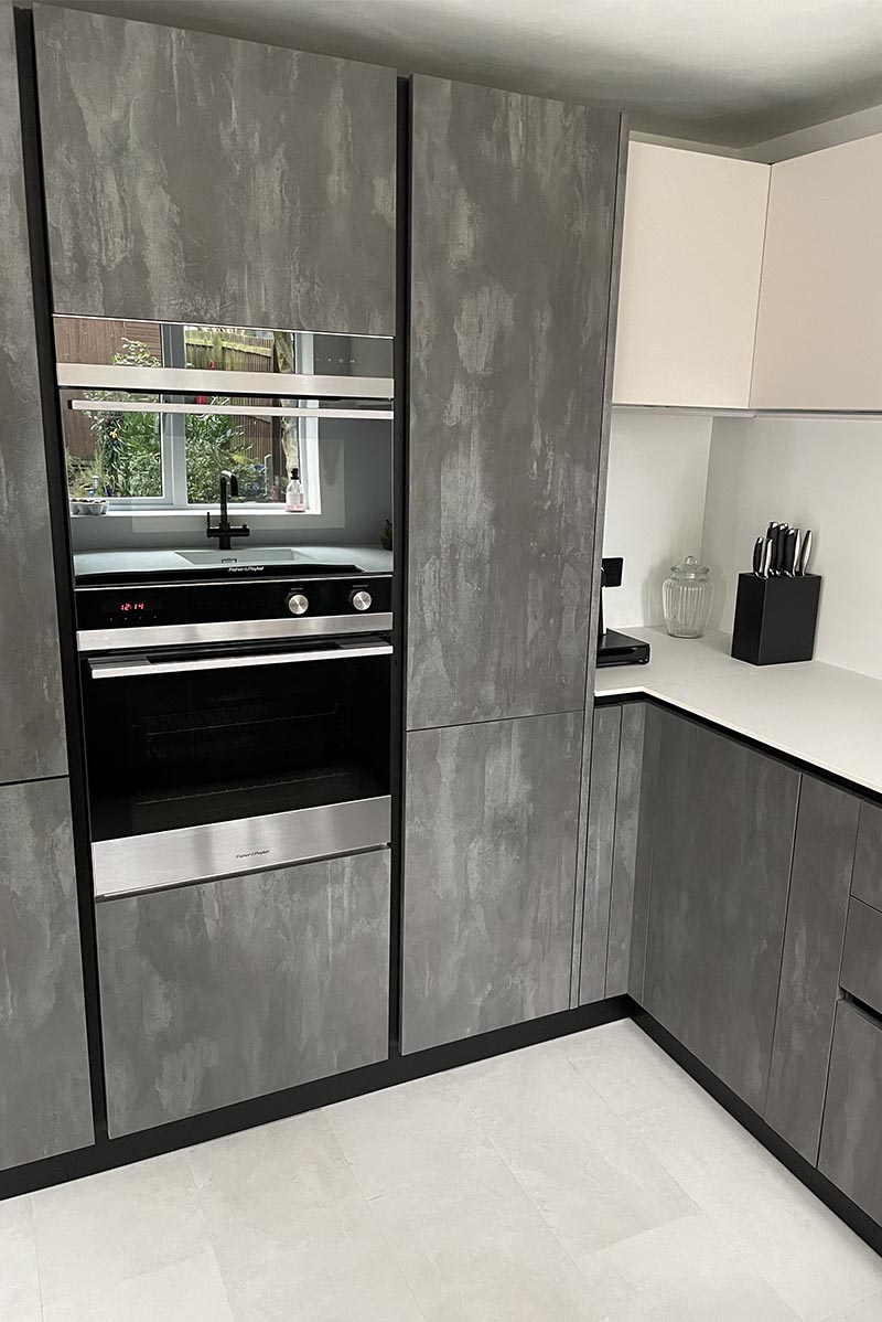 Contemporary style kitchen & dining space with two tone cabinets in Daventry 2