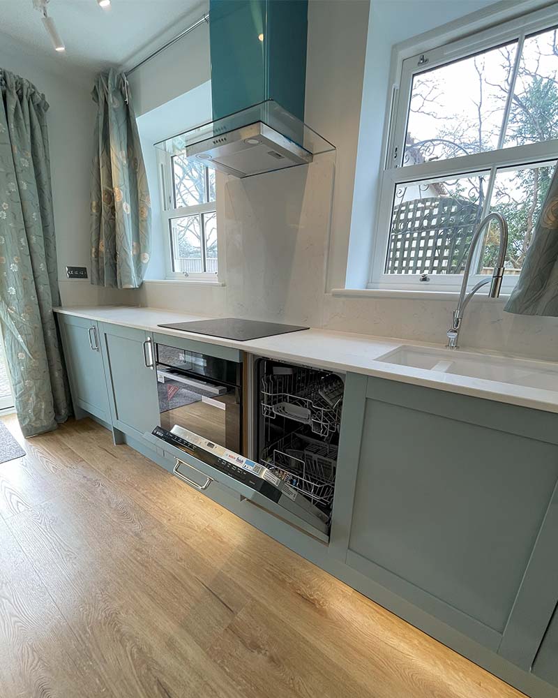 Pale blue shaker kitchen in Wimborne 8