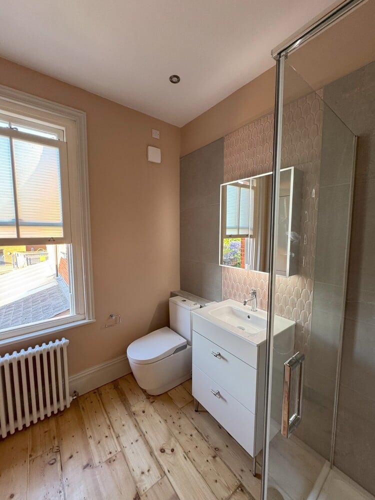 Pink Shower and Utility Room - 1