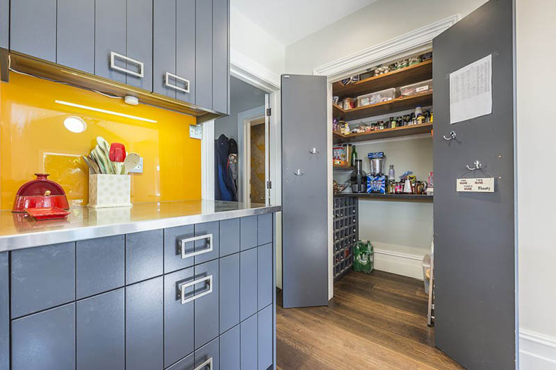 A Pop of Orange for this open kitchen by Tess Stobie 3