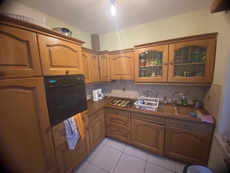 Cuisine de style moderne bois et blanc à Bruxelles 8