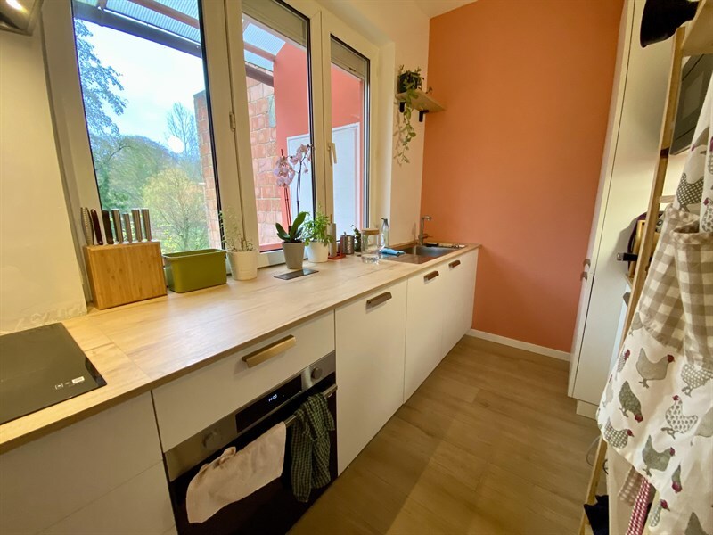 Cuisine en linéaire bois et blanc à Linkebeek | Raison Home - 6