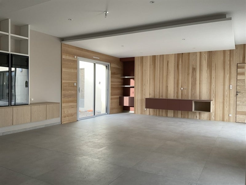 Espace entrée, bibliothèque et meuble TV à Lucon 1