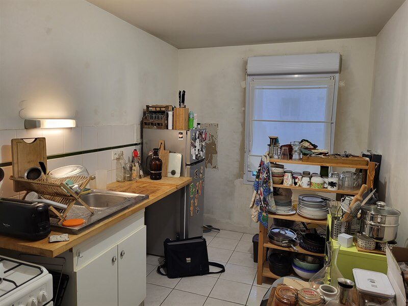 Cuisine fermée de style contemporain bois et blanc à Nantes 7