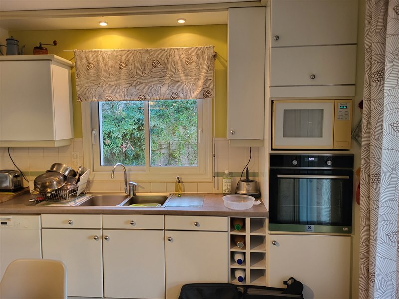 Cuisine en L bois et orange à La Haie Fouassiere | Raison Home - 8