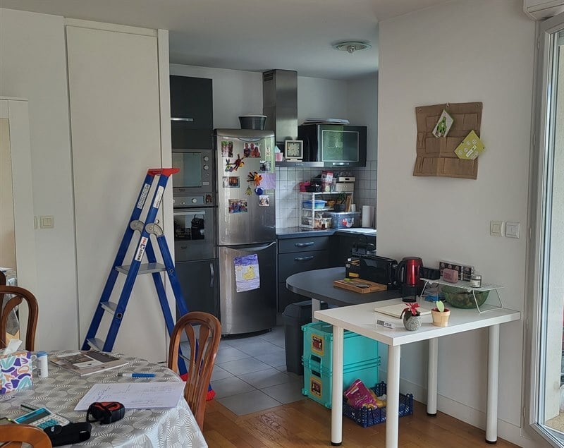 Cuisine ouverte bois et beige à Basse Goulaine 7