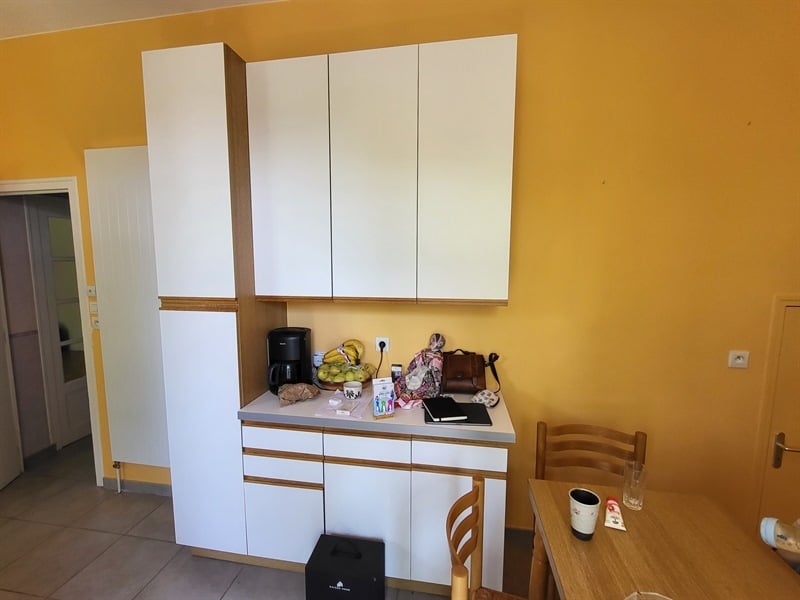 Cuisine en L moderne bois et orange à Nantes | Raison Home - 7